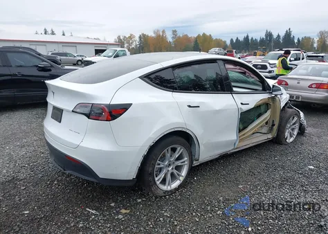 2023 Tesla Model Y Awd/Long Range Dual Motor All-Wheel Drive из США, поврежденный, VIN 7SAYGDEE9PF630169